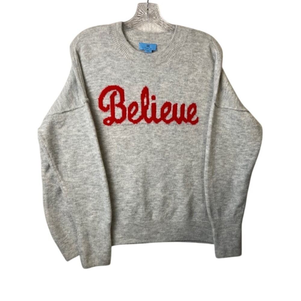 CeCe Long-Sleeved Crewneck Sweater Featuring "Believe" In Red